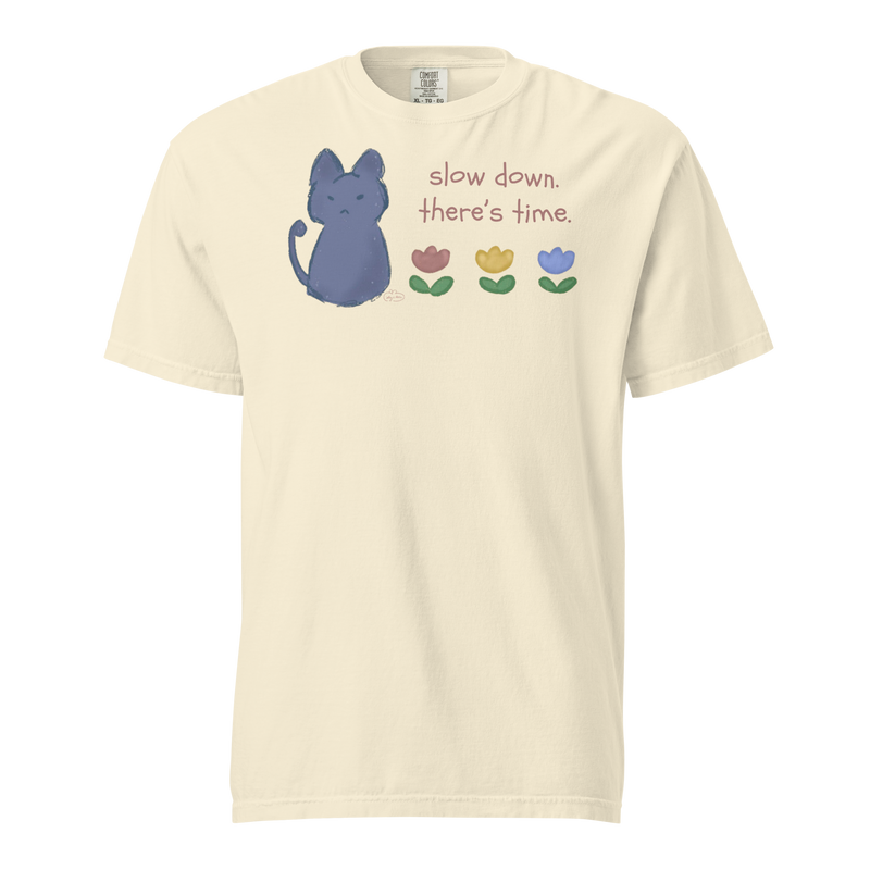 Ivory Comfort Colors T-shirt with a blue cat, three flowers, and 'Slow down, there's time' lettering.
