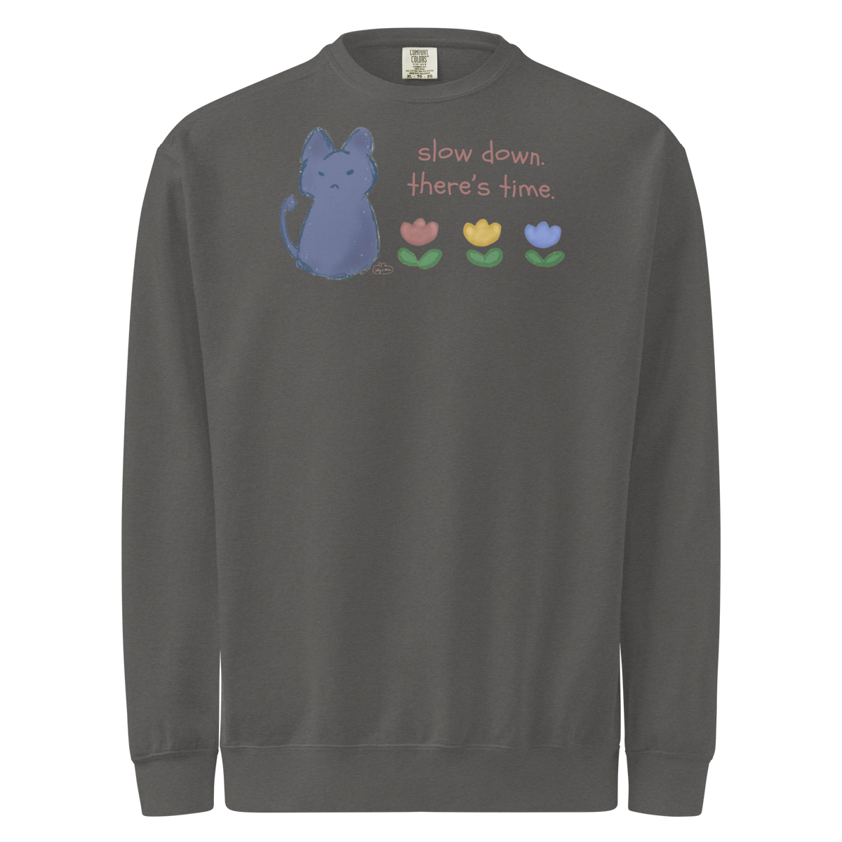 Charcoal grey garment-dyed sweatshirt with a blue cat, three flowers, and 'Slow down, there's time' lettering.