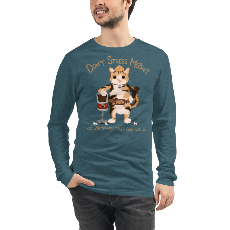 Model wearing a heather deep teal long sleeve T-shirt with a calico cowboy cat and Don't Stress Meowt cat cafe lettering.