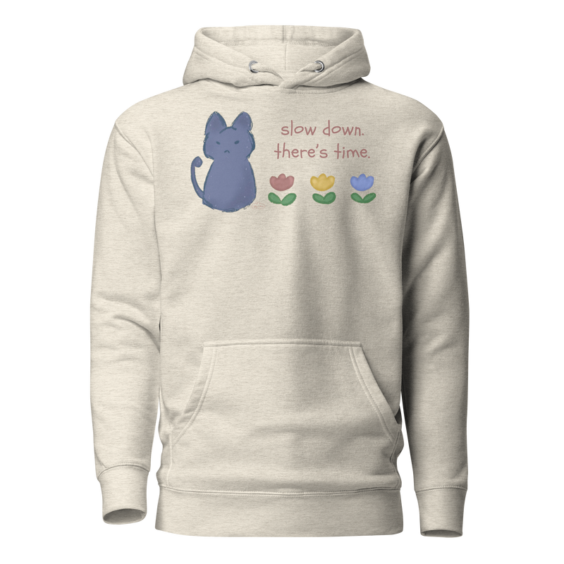 Oatmeal heather beige pullover hoodie with a blue cat, three flowers, and 'Slow down, there's time' lettering.