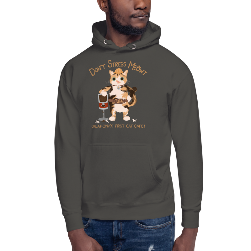 Model wearing a vintage black pullover hoodie with a calico cowboy cat and Don't Stress Meowt cat cafe lettering.
