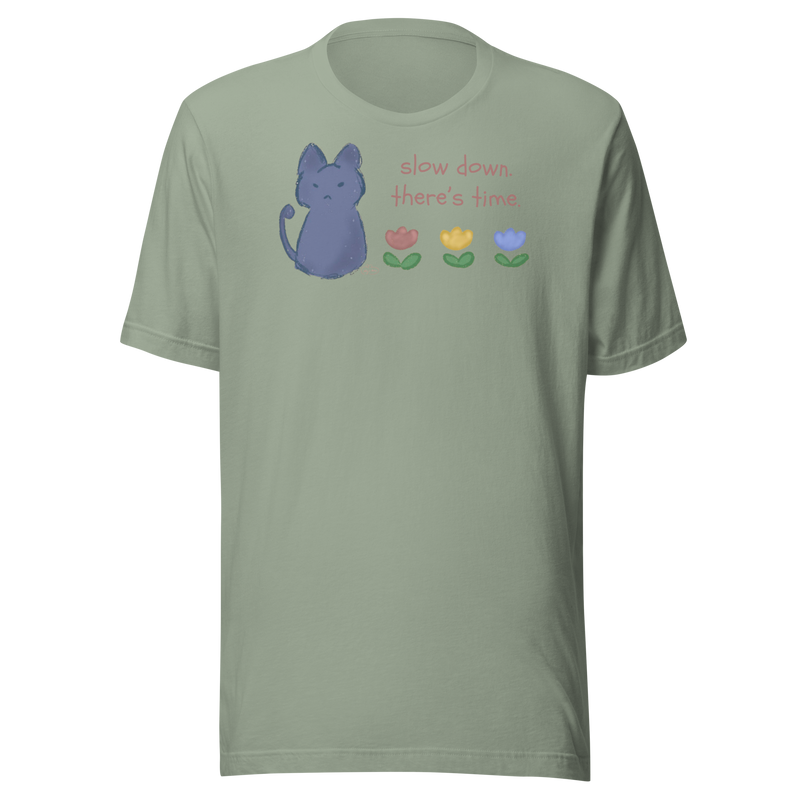 Sage green Bella + Canvas T-shirt with a blue cat, three flowers, and 'Slow down, there's time' lettering.