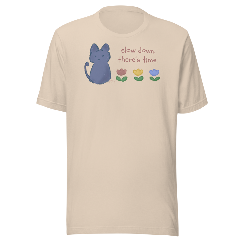 Soft cream Bella + Canvas T-shirt with a blue cat, three flowers, and 'Slow down, there's time' lettering.