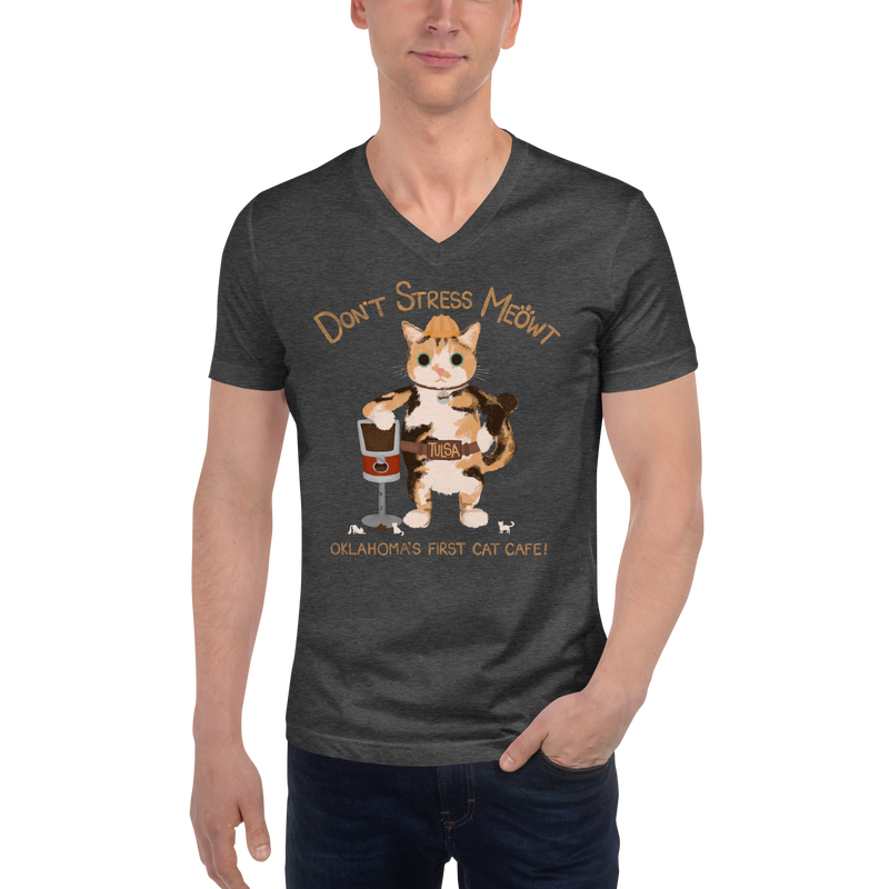 Model wearing a dark heather grey V-neck T-shirt with a calico cowboy cat and Don't Stress Meowt cat cafe lettering.